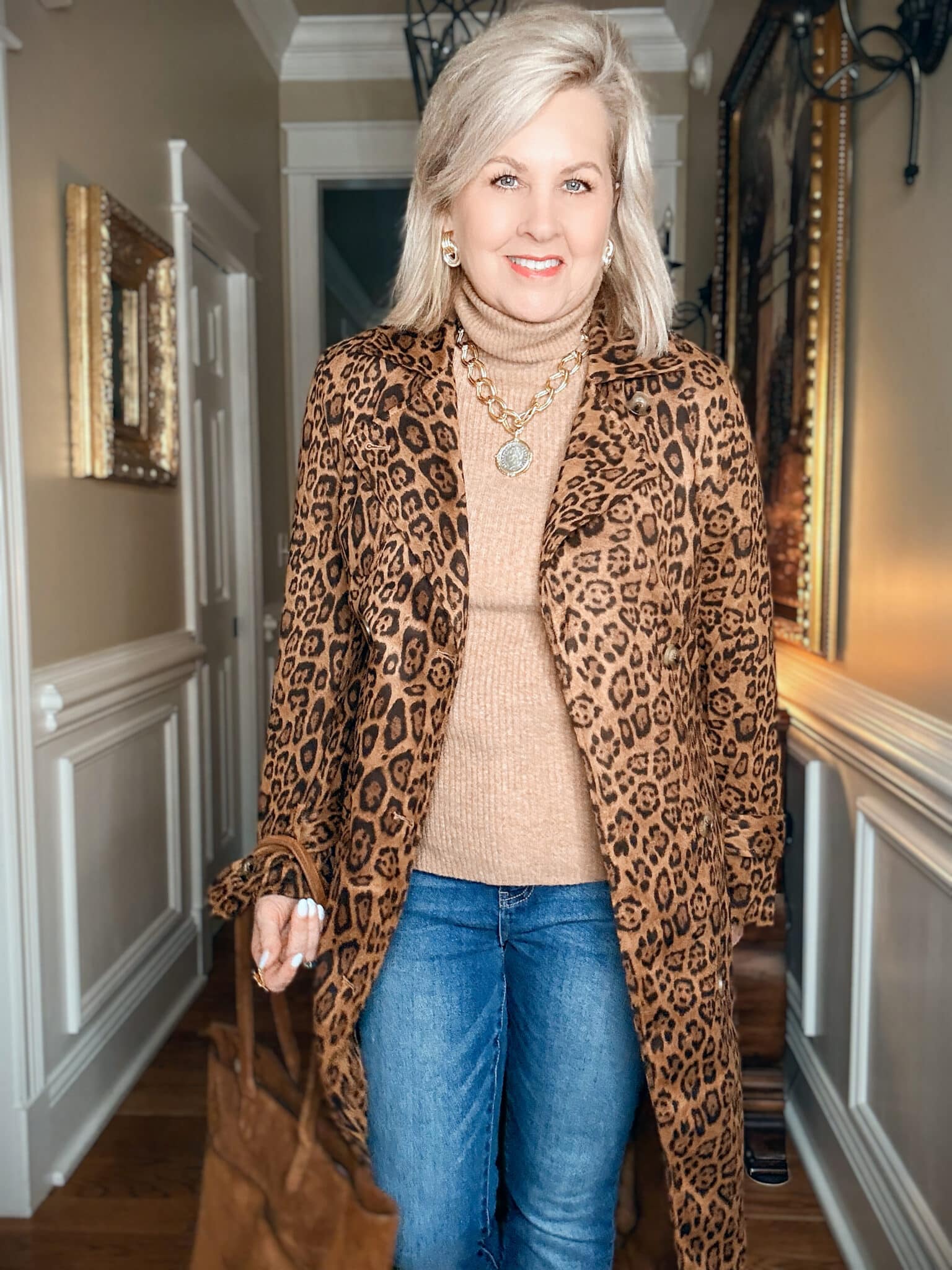 Tania wearing a leopard print coat from Amazon with a cashmere sweater