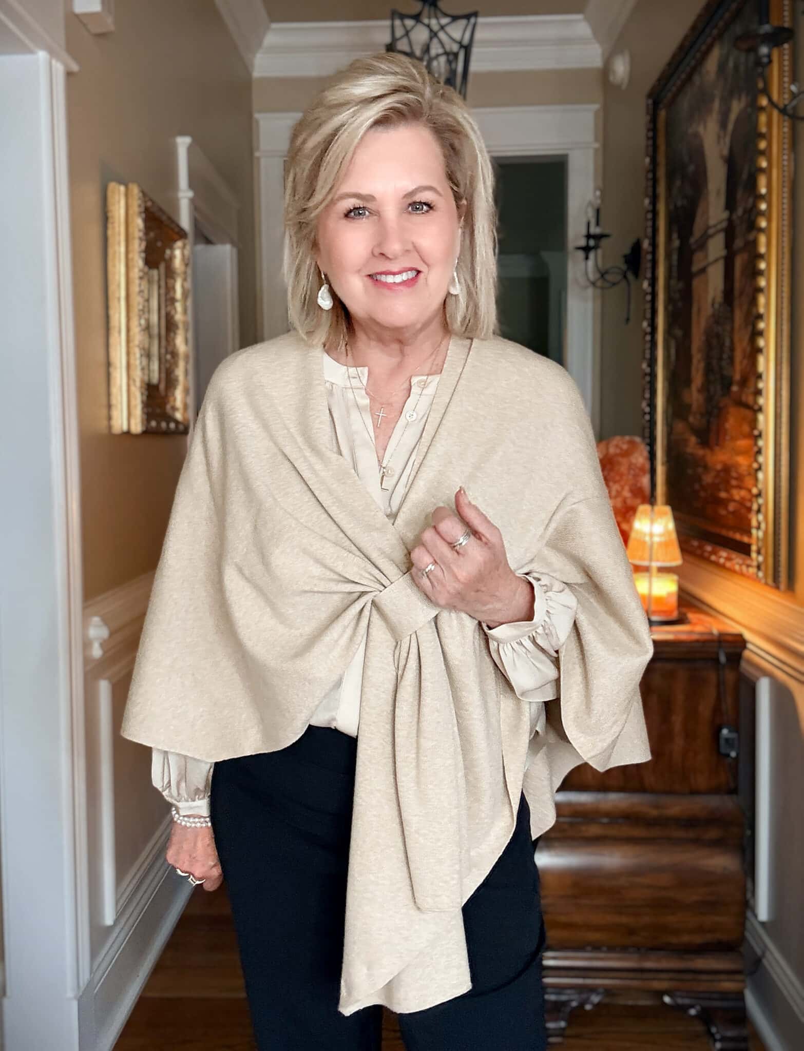 Tania wearing a sweater wrap from Amazon