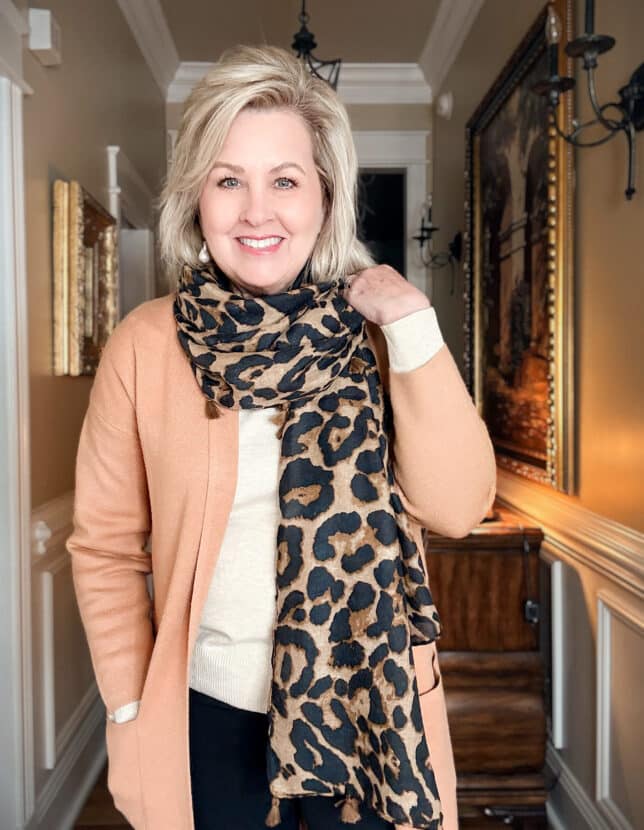 Tania wearing a long duster cardigan and leopard print scarf from Amazon