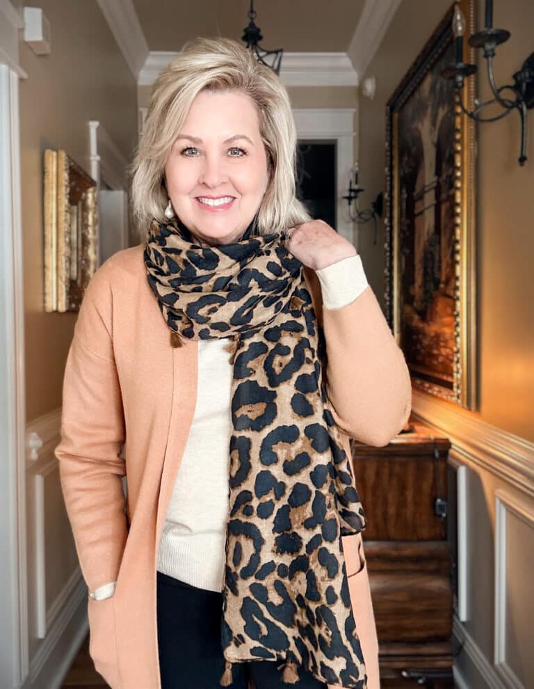 Tania wearing a long duster cardigan and leopard print scarf from Amazon