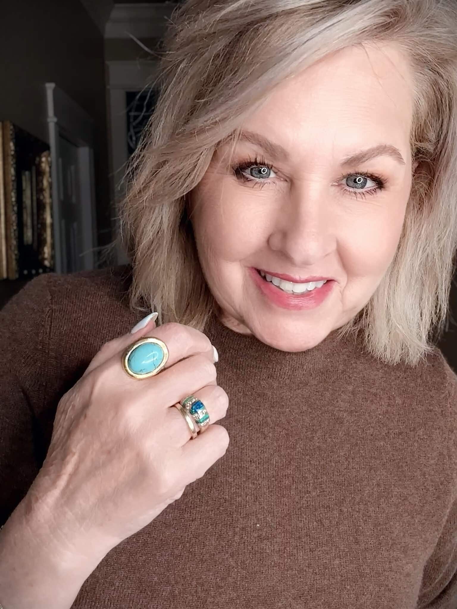 turquoise Caroline Ring worn on index finger