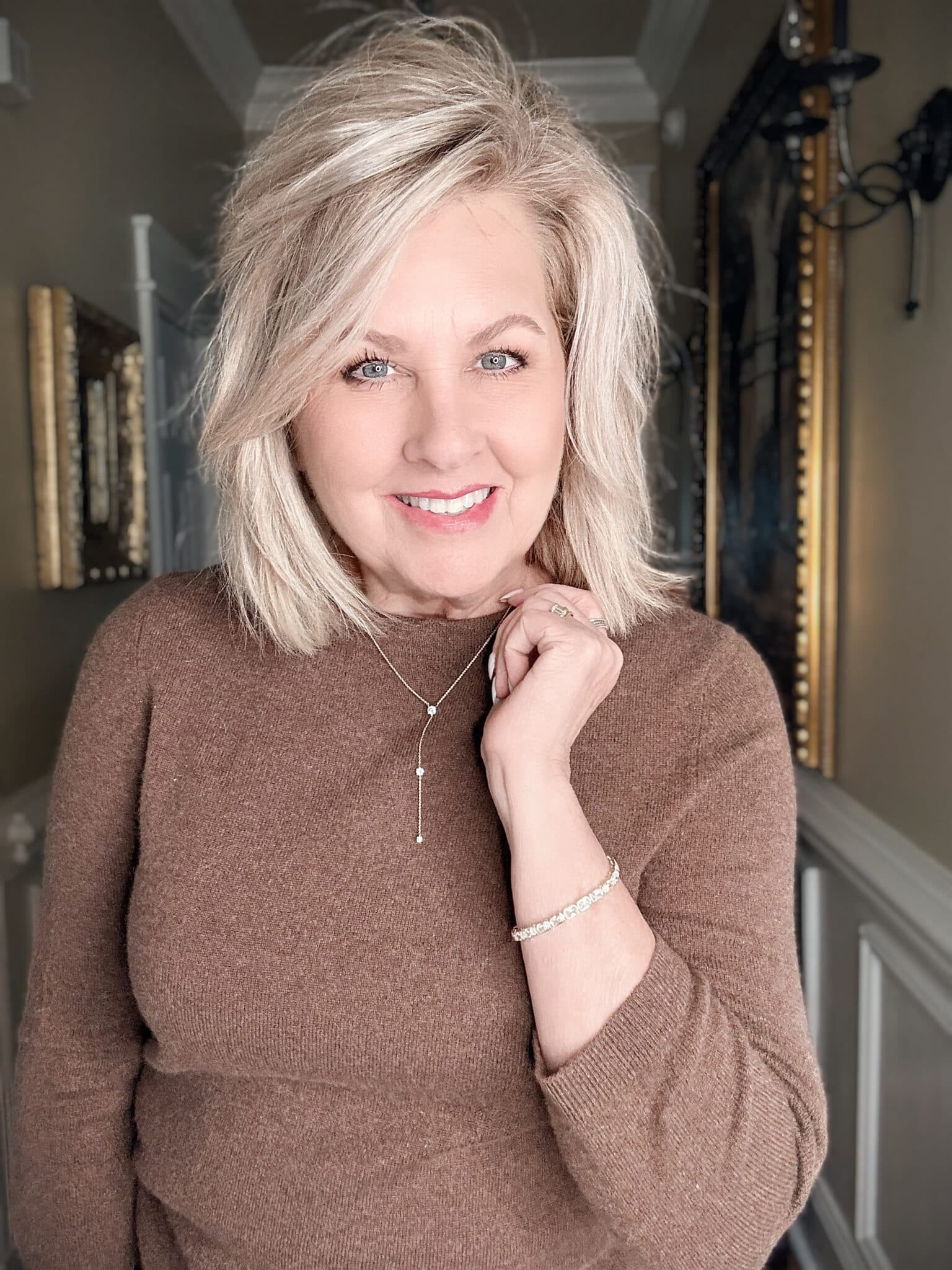 Electric Picks Jade Lariat Necklace layered on neutral sweater