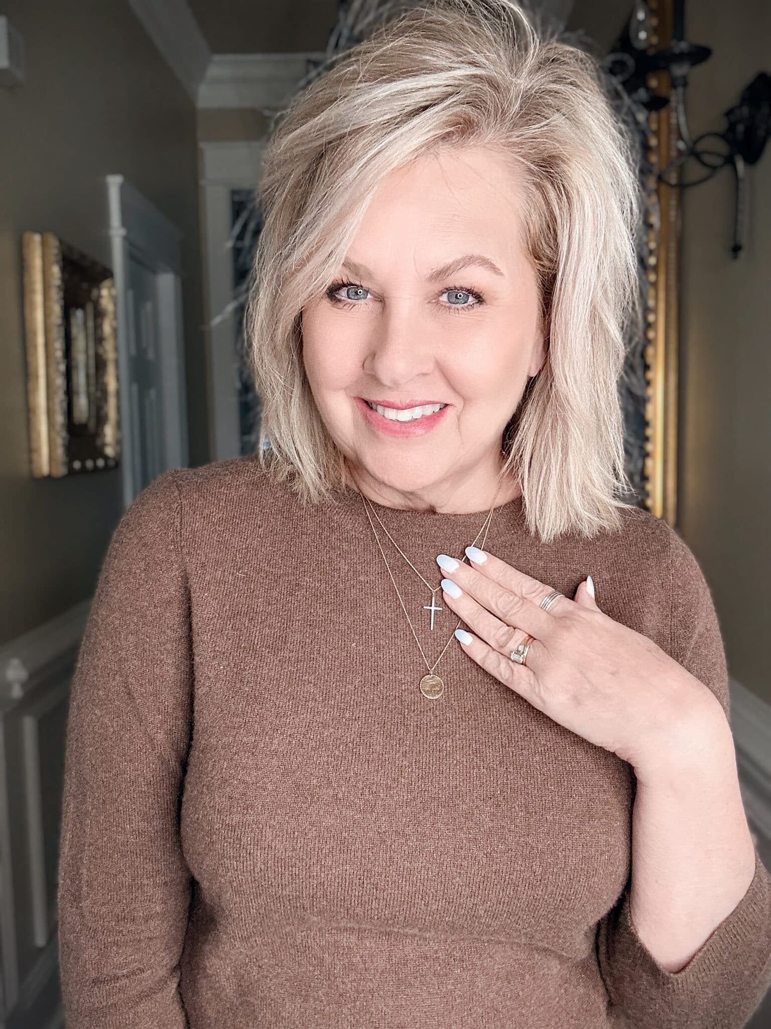 Kendra Scott 14k gold cross necklace layered with Zoe Chicco mantra necklace Trust the Path