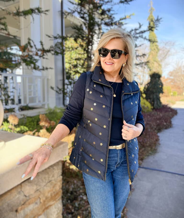Talbots navy vest with gold snowflakes and a navy tee