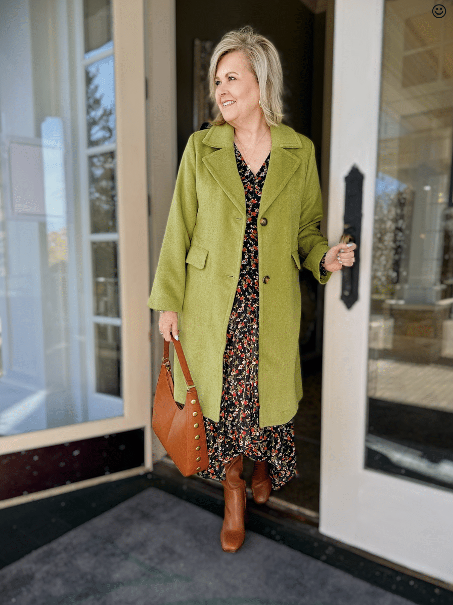 Vibrant green long coat from Kohl’s styled over fall floral dress for Thanksgiving