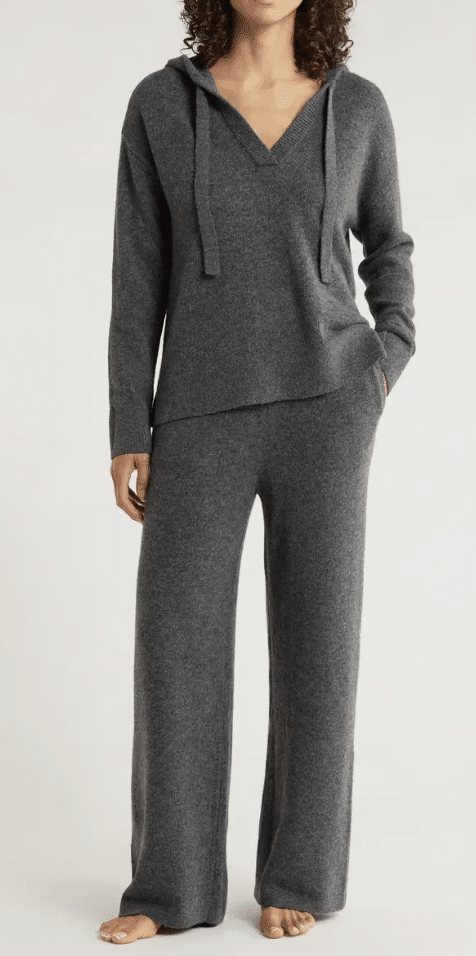 Cozy hooded lounge set in soft fabric with matching top and pants.