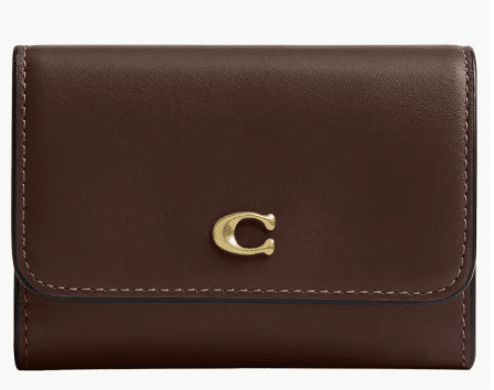 COACH Essential leather card holder in a slim minimalist design.