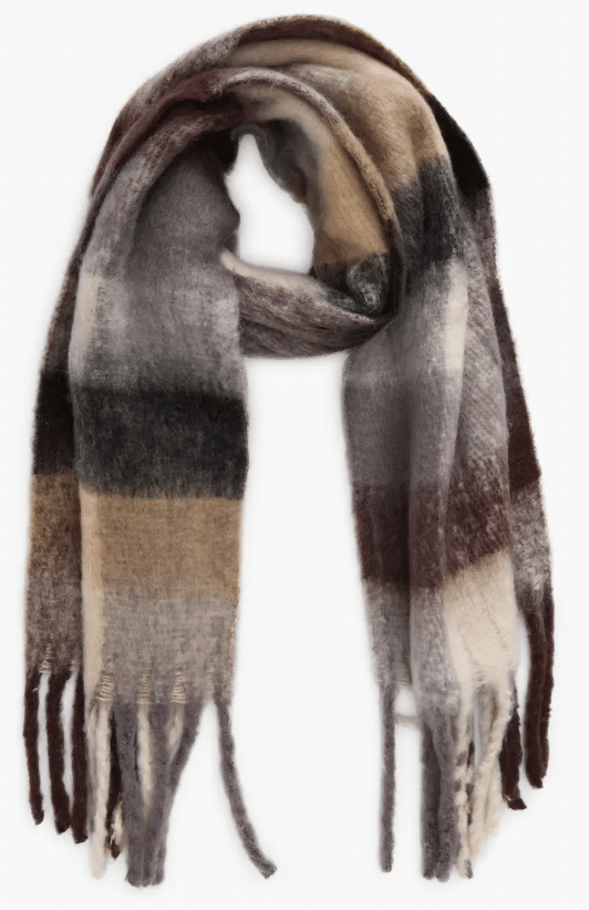 BP fringe blanket scarf in soft fabric with long fringe edges.