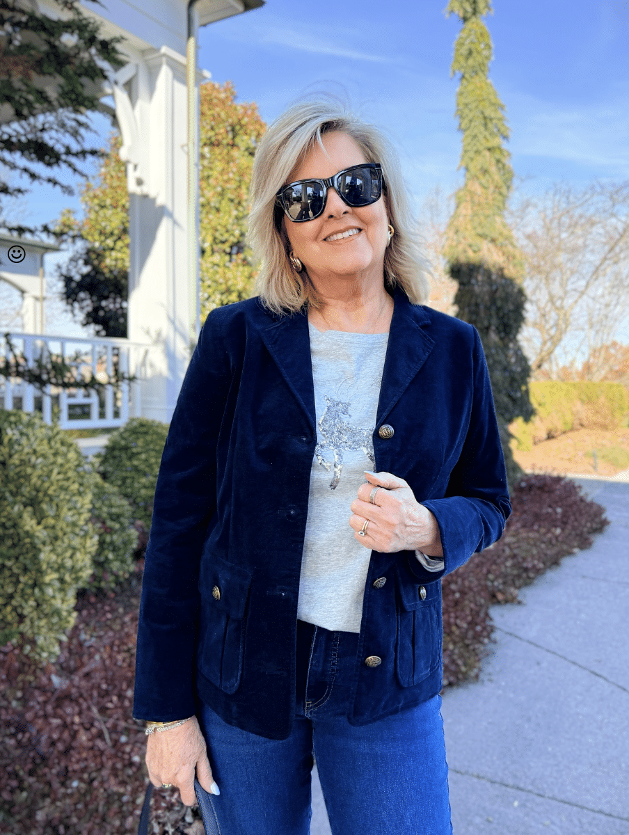 Tania is a navy velveteen blazer and deer sequin tee from Talbots