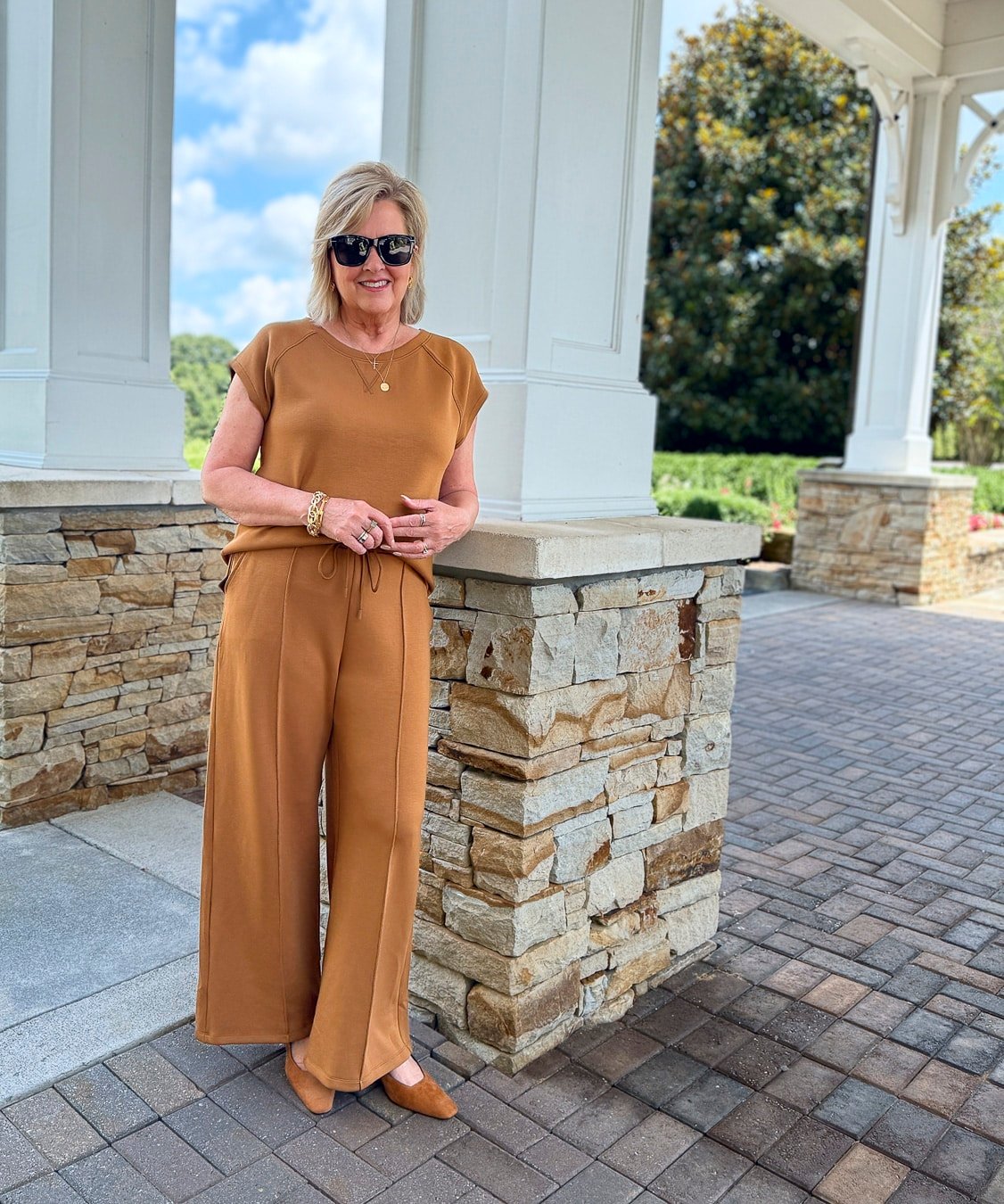 Caramel brown top with matching wide-leg pants, flattering monochromatic brown outfit