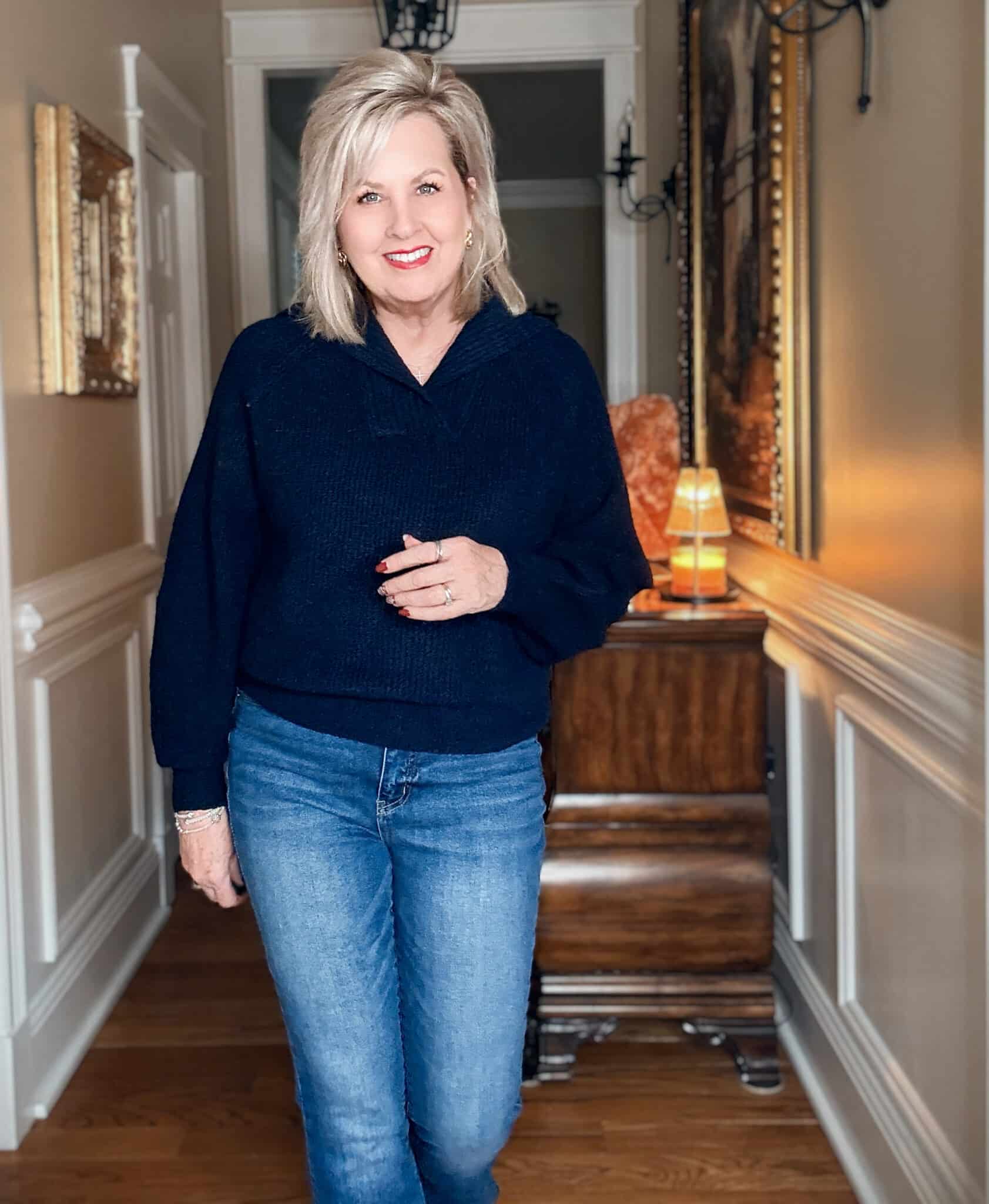 Tania wearing a navy chunky sweater from Walmart