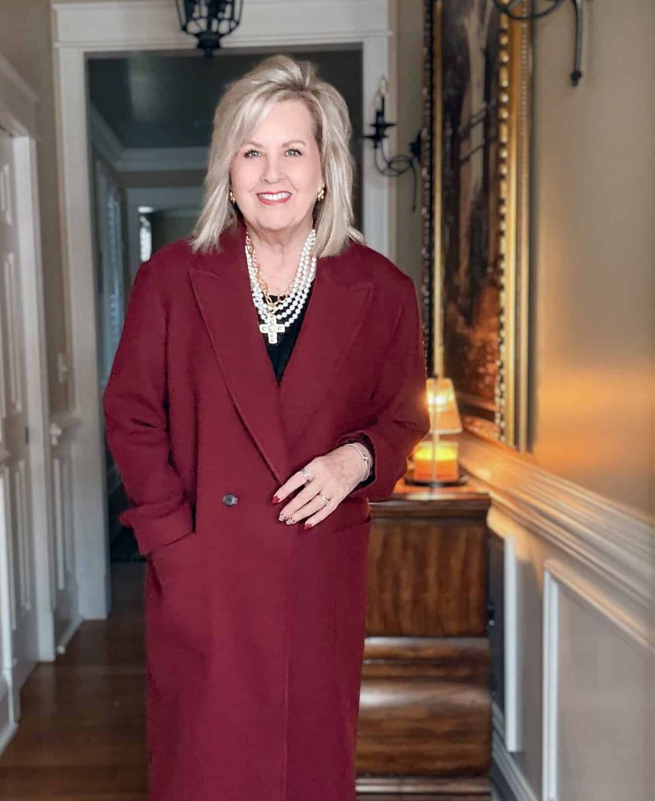 Tania wearing a double breasted burgundy dress coat from Loft