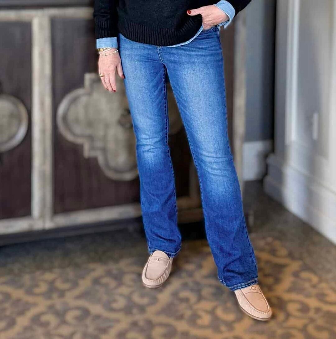 Tania wearing a bootcut jeans from Walmart with brown loafers