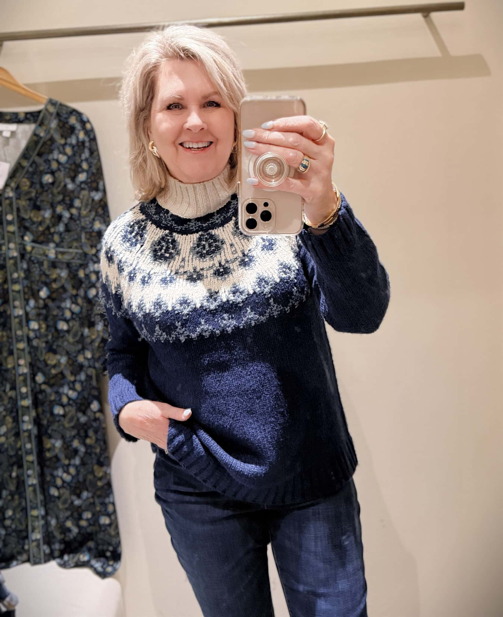 Tania doing a try-on haul at J.Jill  of a navy fair isle sweater