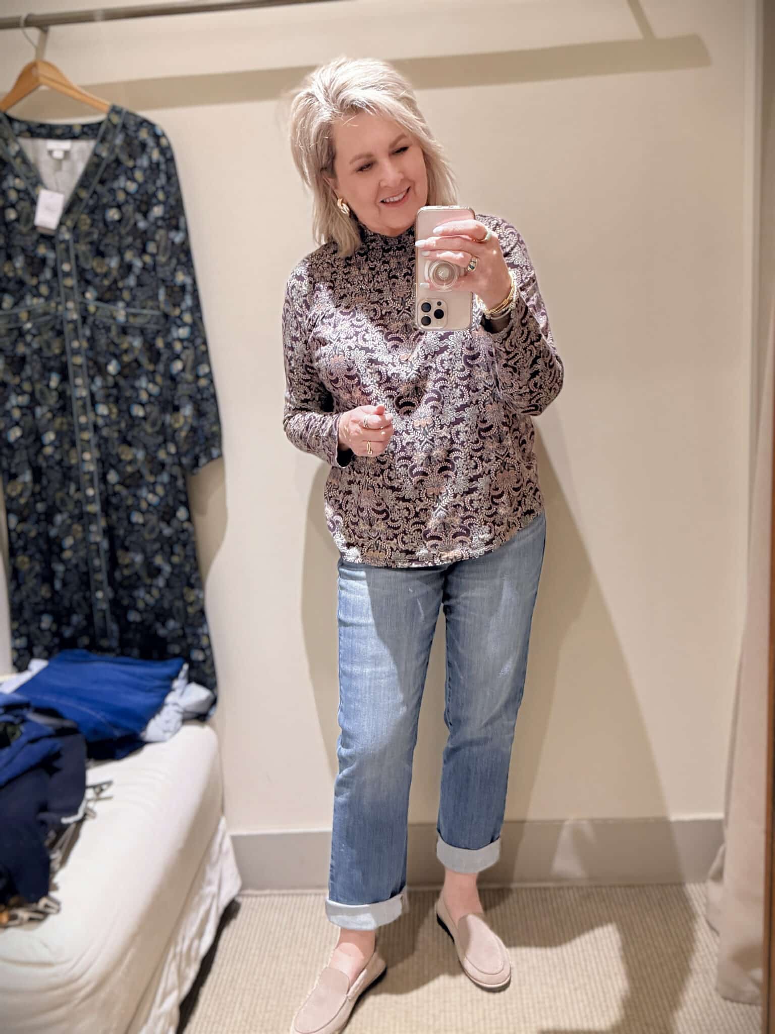 Tania doing a try-on haul at J.Jill  of jeans and a printed high neck top