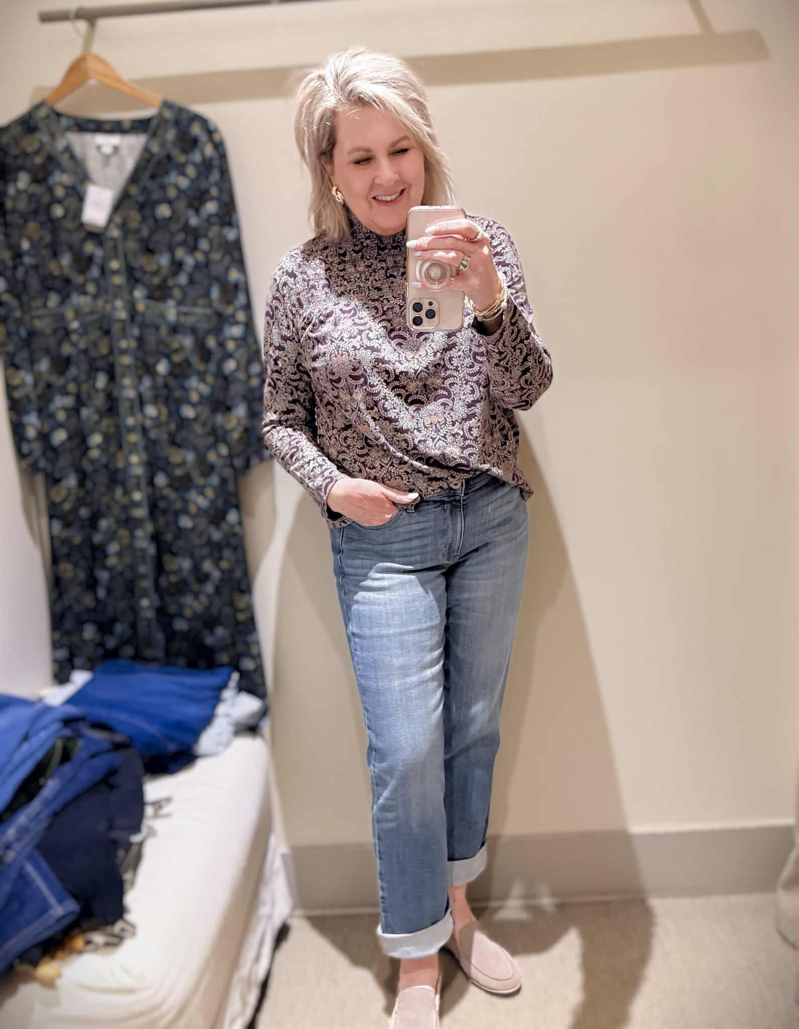 Tania doing a try-on haul at J.Jill  of jeans and a tucked in printed high neck top