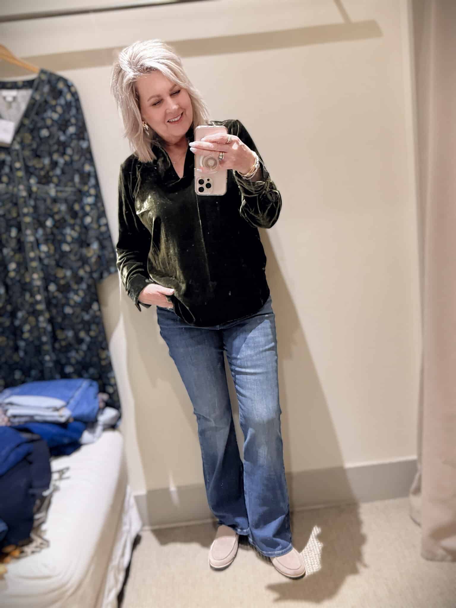 Tania doing a try-on haul at J.Jill of jeans and a dark green velvet top