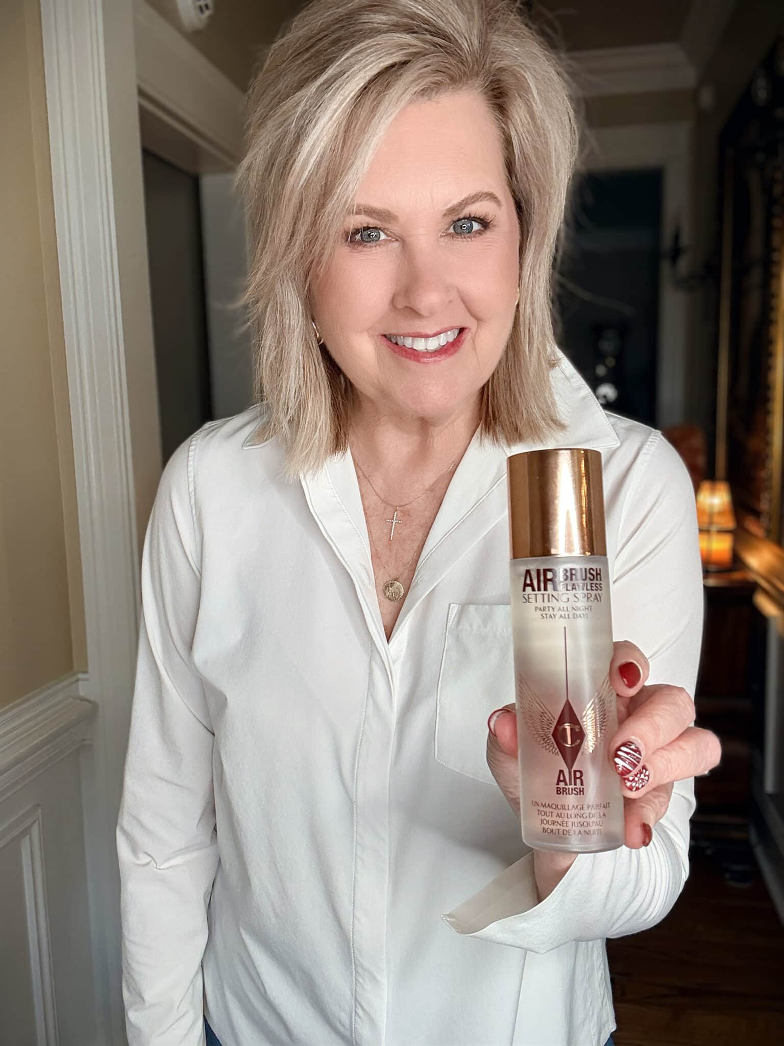 Tania using Charlotte Tilbury Setting spray