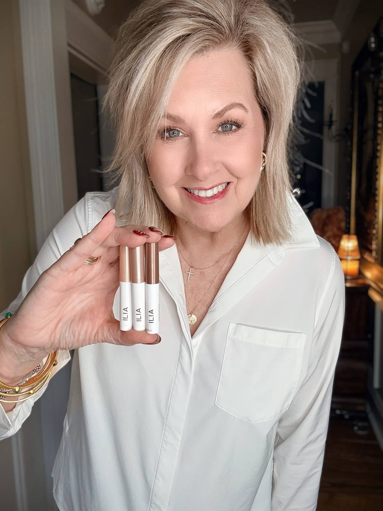 Tania using Ilia cream eyeshadow trio