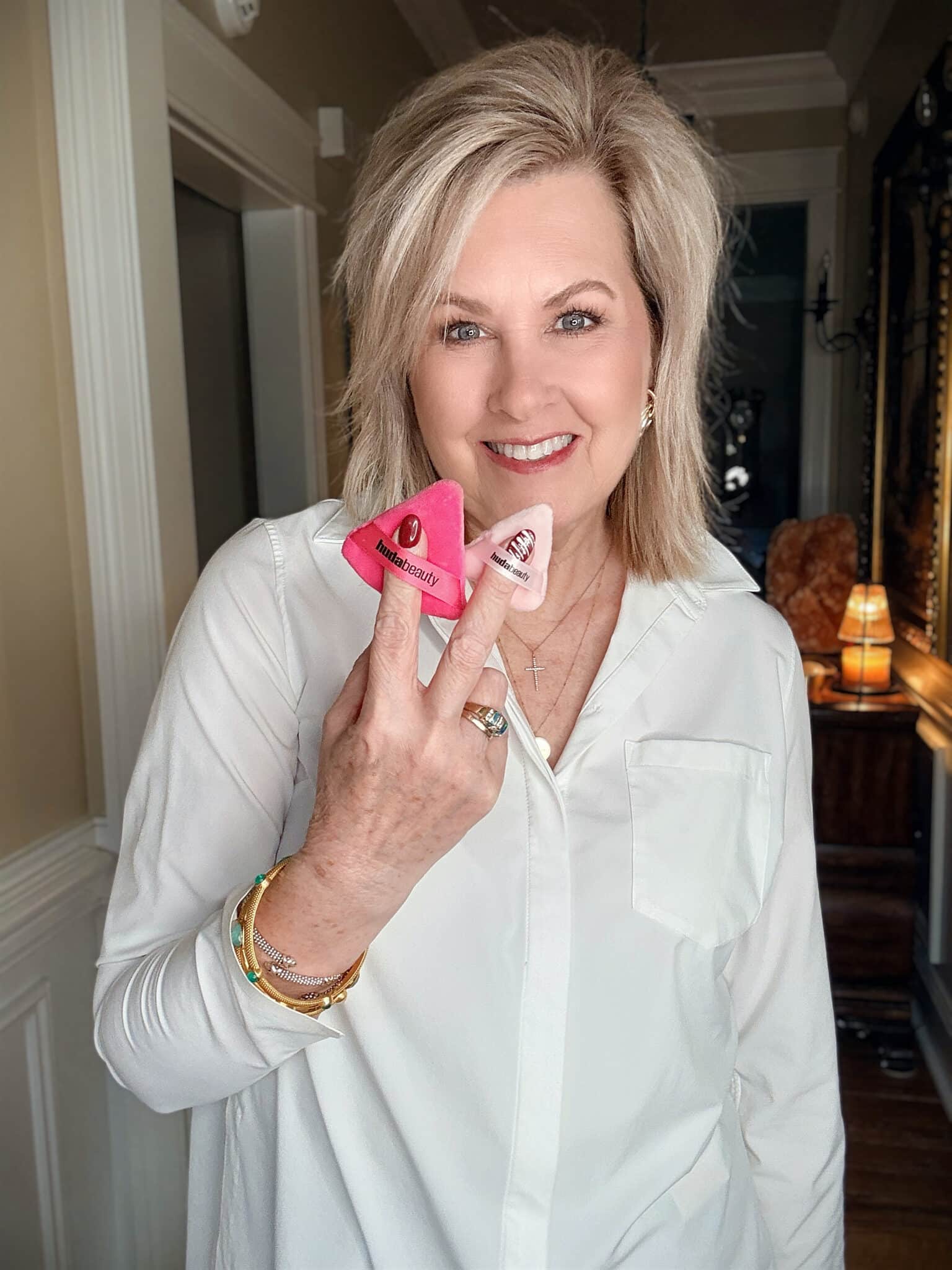 Tania using Huda powder puffs