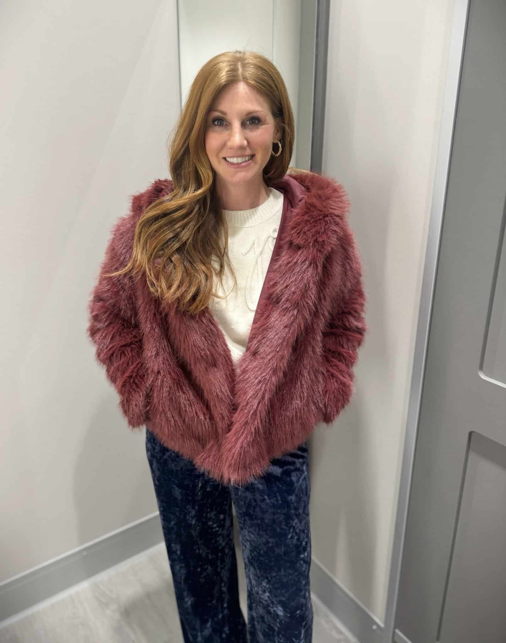 Stephanie is party ready in this winter faux fur jacket from Target