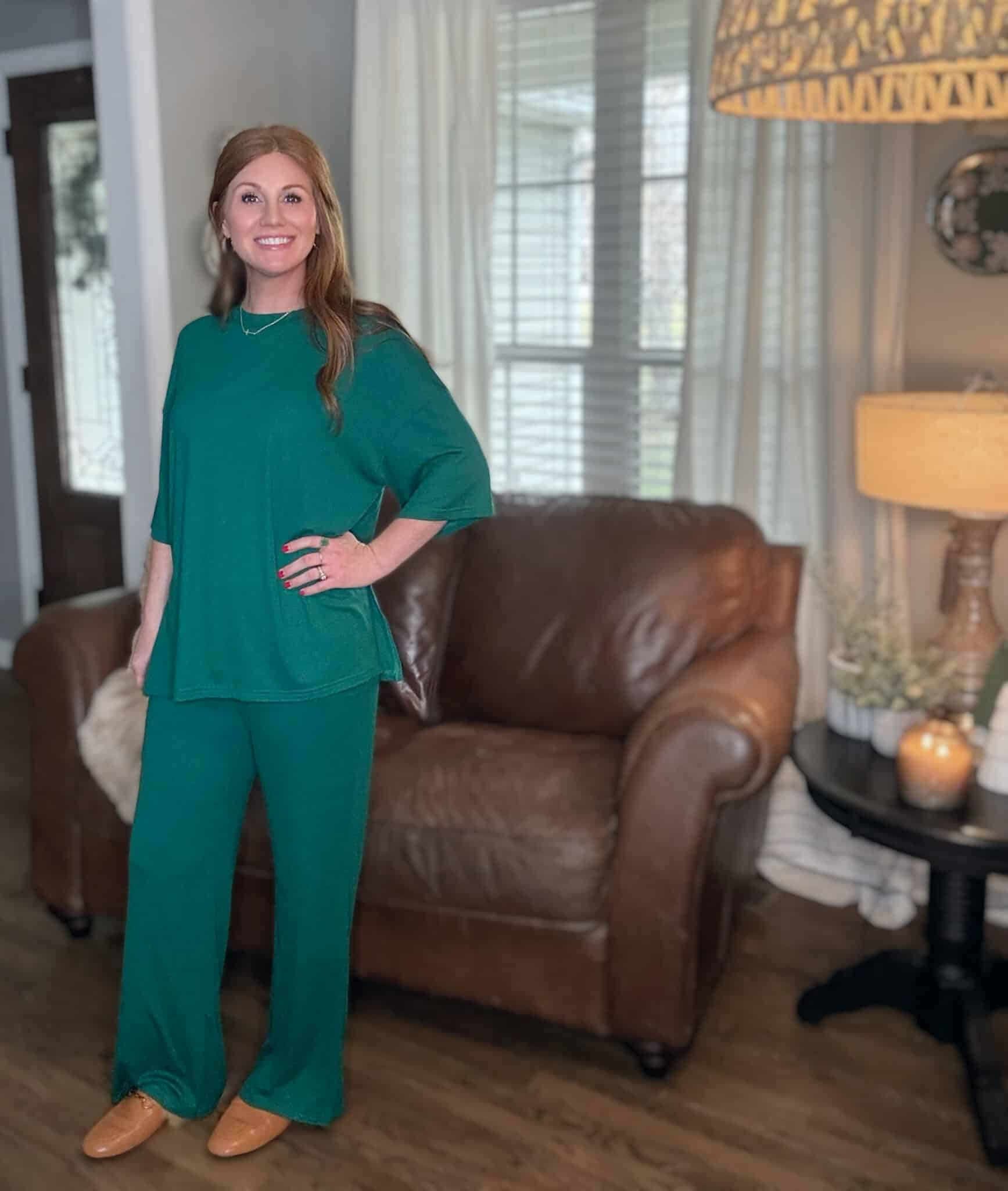 Petite red head wearing a dark green loungewear set from Amazon