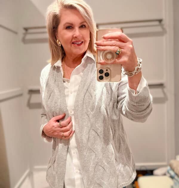 Tania wearing a white button tunic top with a light gray texture cardigan from J.Jill