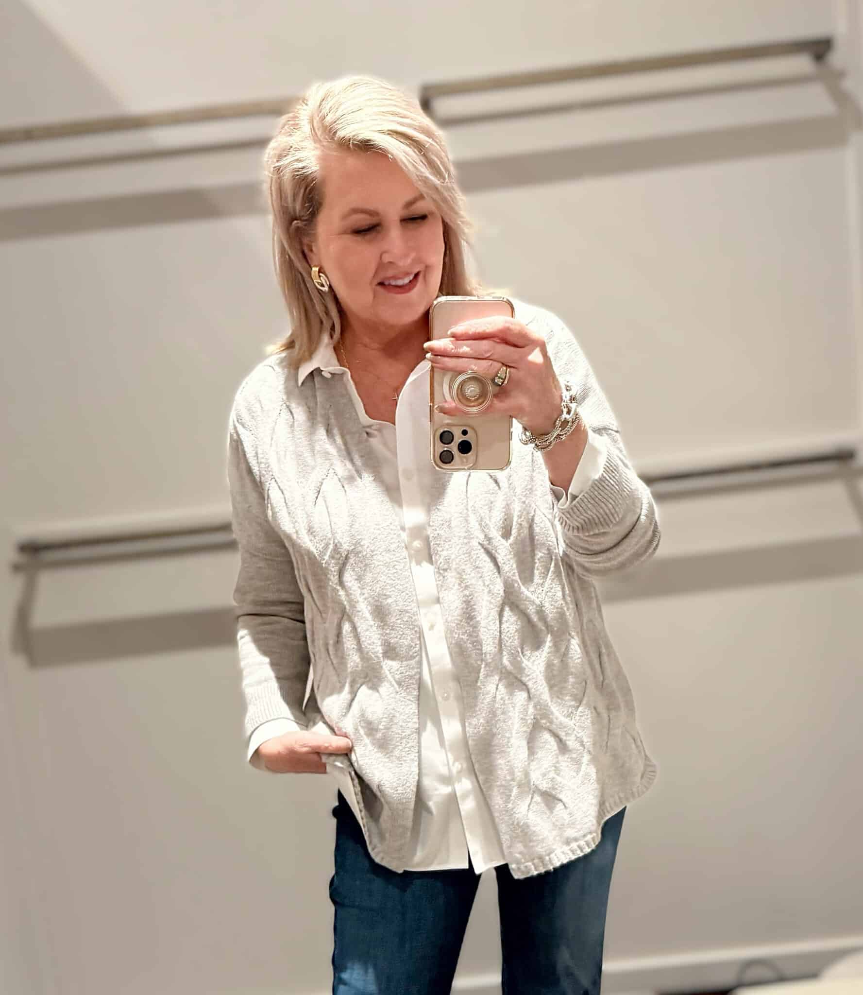 Tania wearing a white button up no iron shirt and a textured cardigan from J.Jill