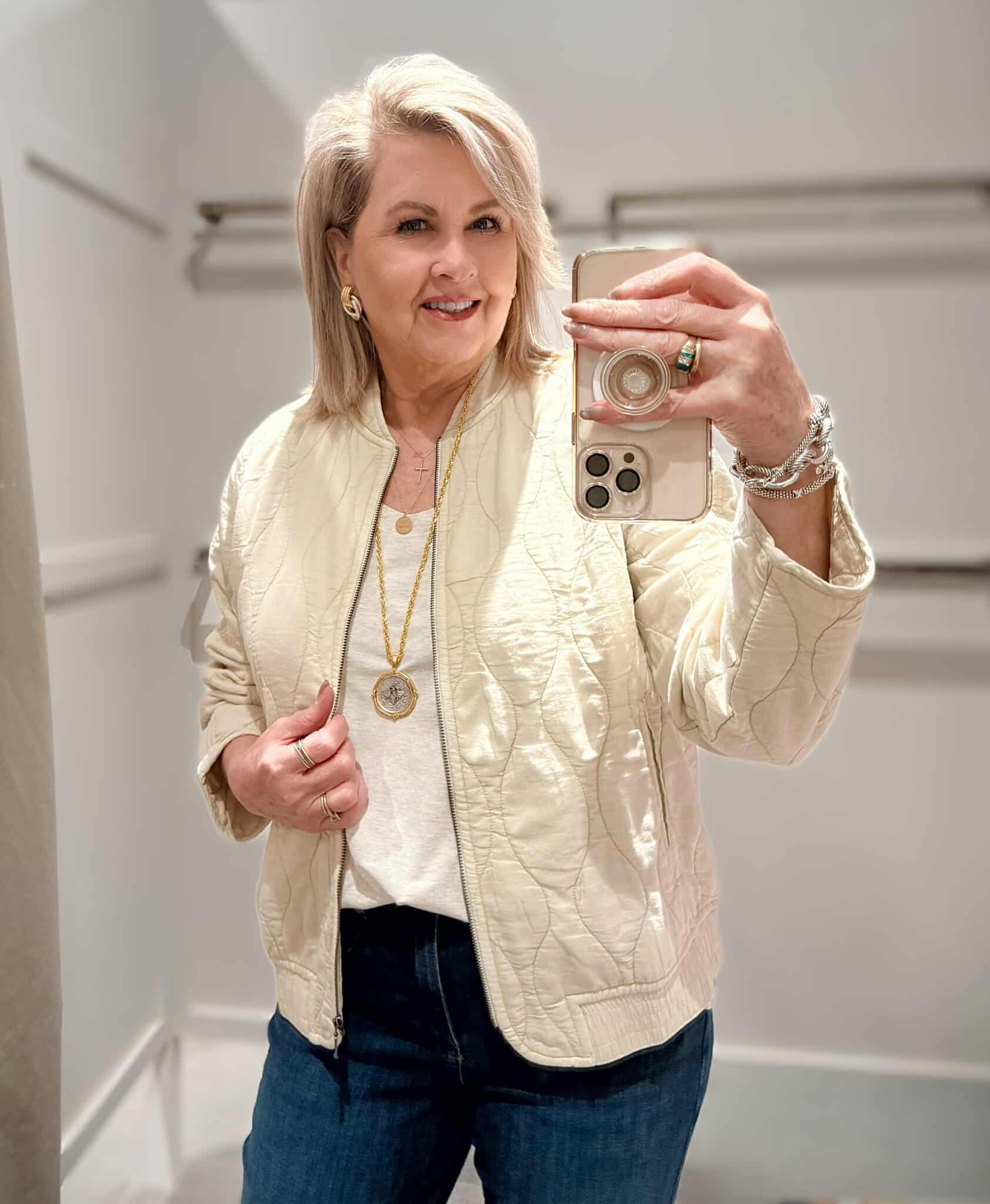 Tania wearing a ivory tank and a quilted jacket from J.Jill