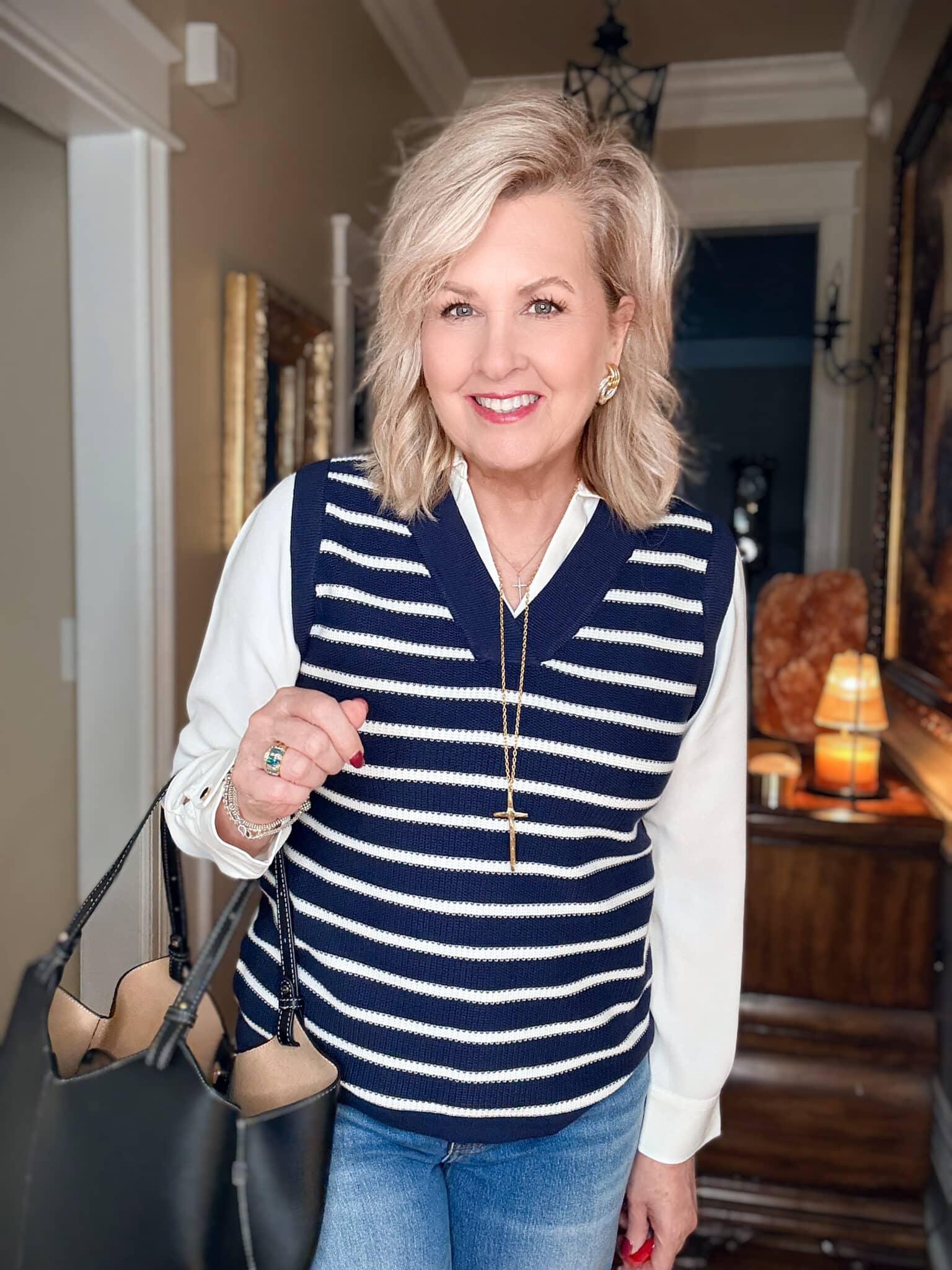 Tania wearing a sweater vest/white shirt combo from Chico's