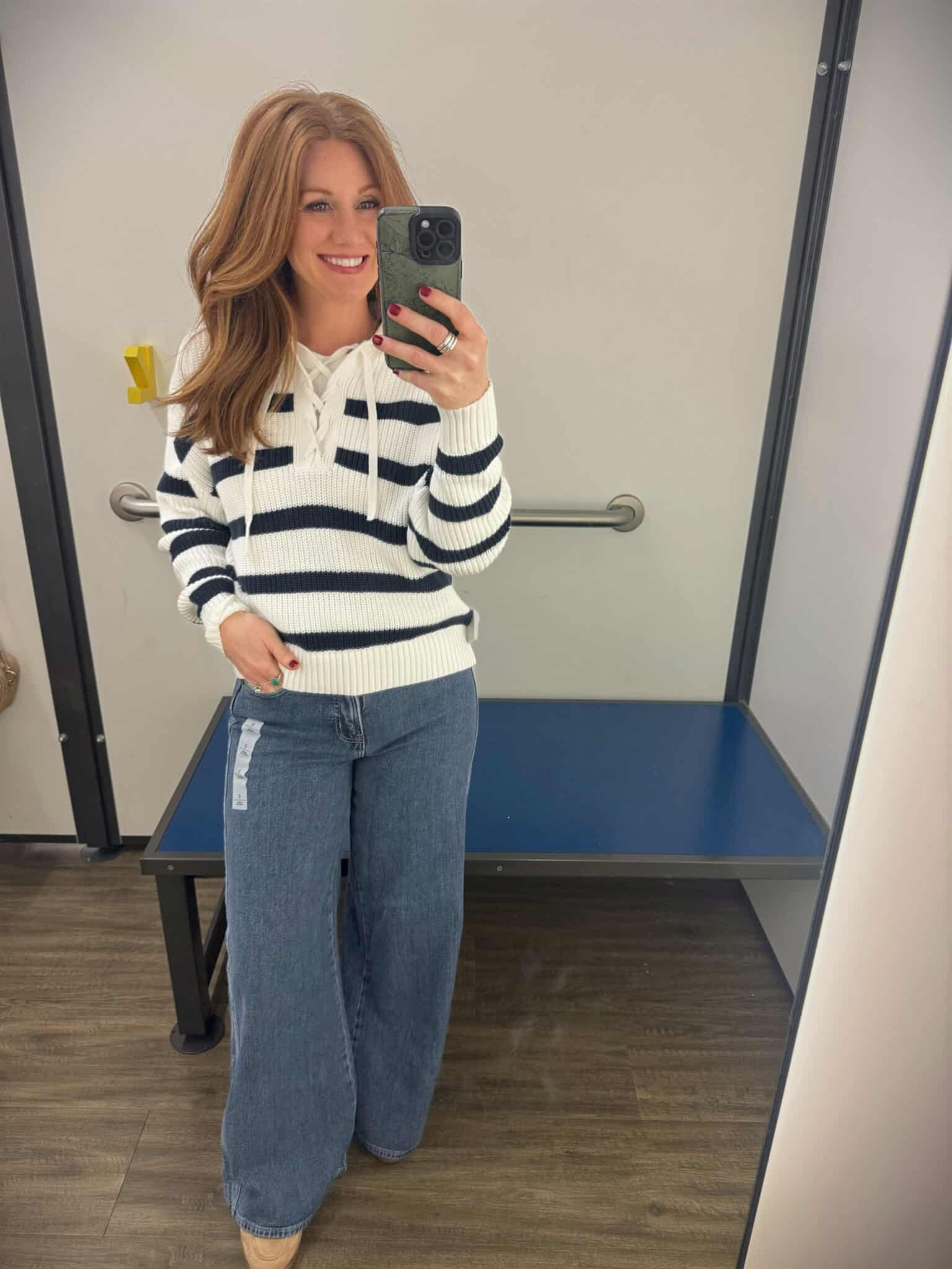 Stephanie styling a striped sweater with wide leg jeans from Old Navy