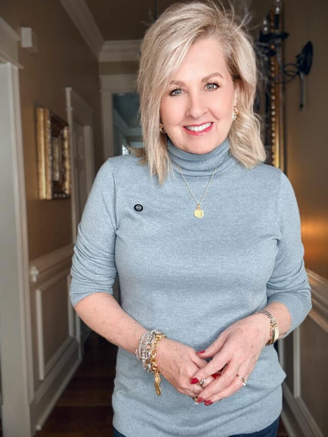 Tania wearing a blue turtleneck sweater from Amazon