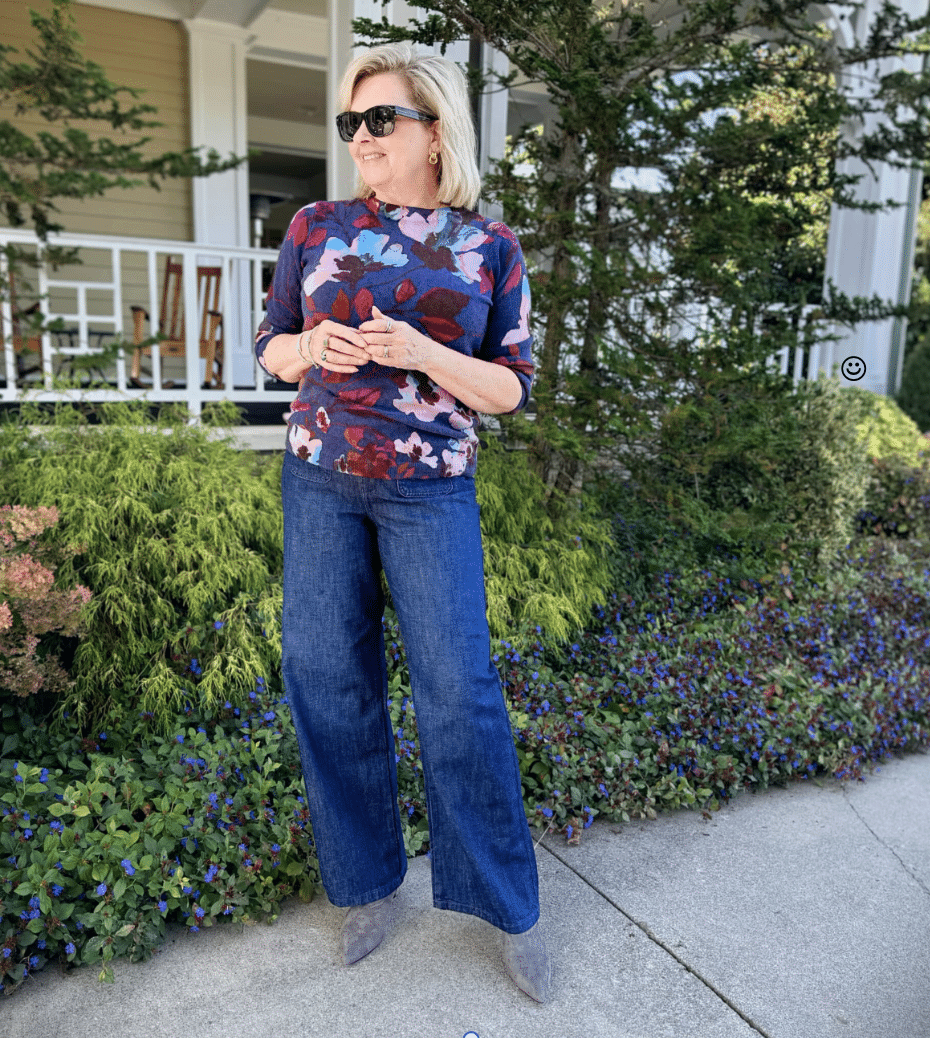 Tania wearing a floral cashmere sweater and jeans from Talbots