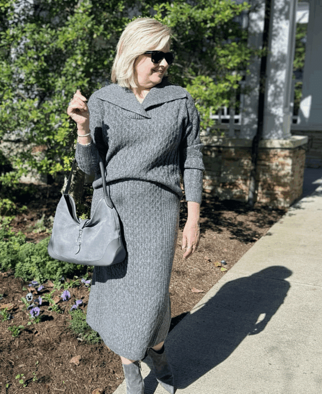 Tania Stephens wearing Talbots gray cable knit sweater and matching midi skirt with gray suede boots and handbag
