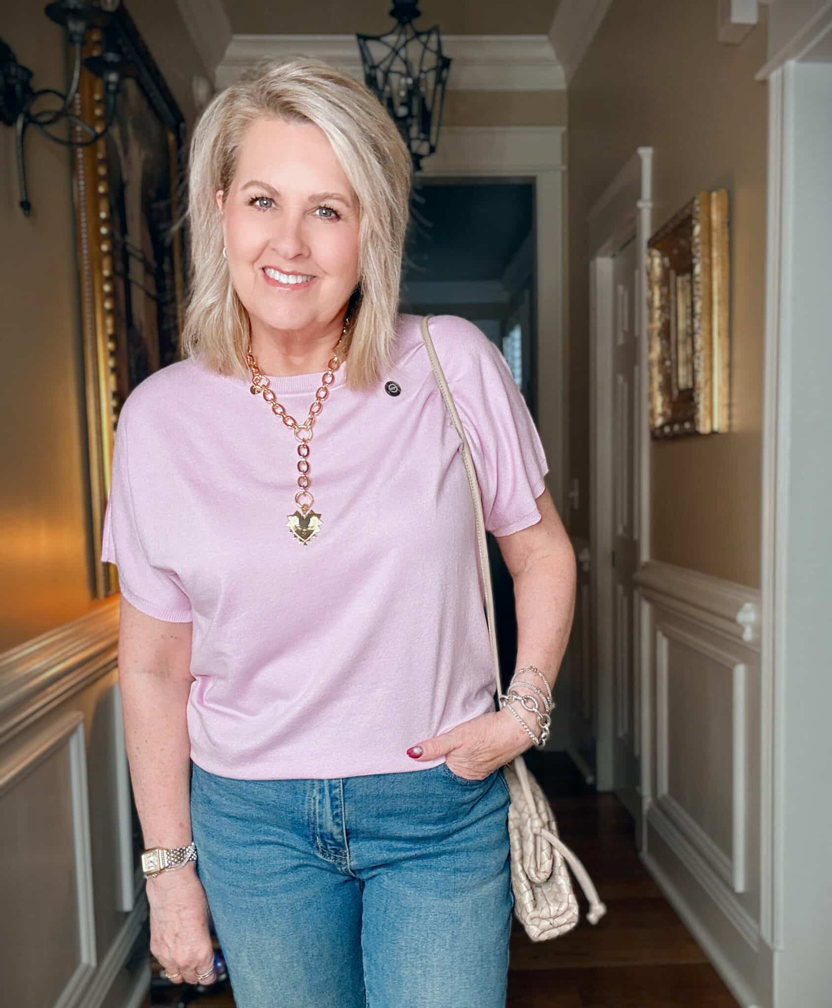 Woman wearing a light pink sweater