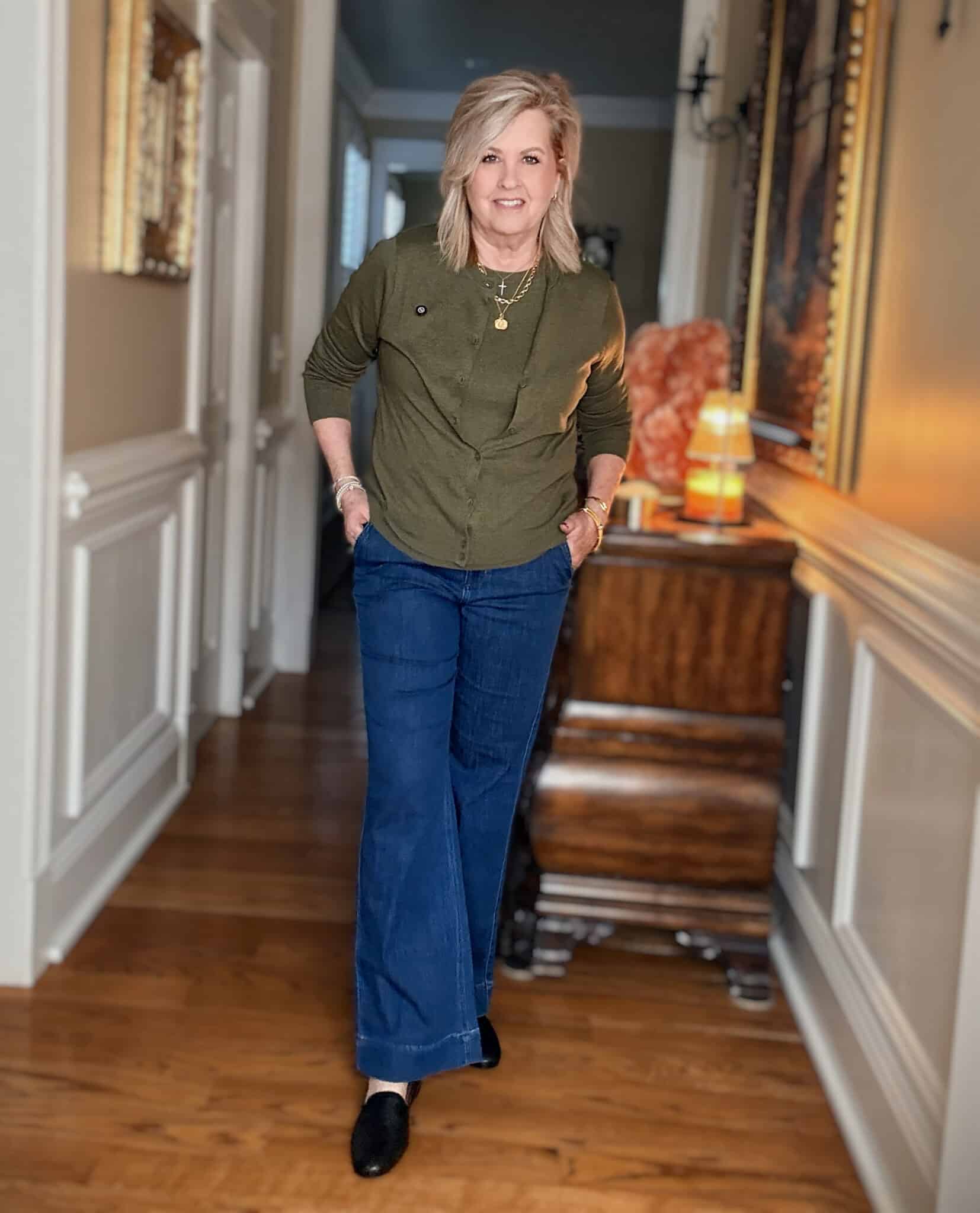 Tania wearing an olive shell and cardigan from J.Crew Factory with dark wash jeans