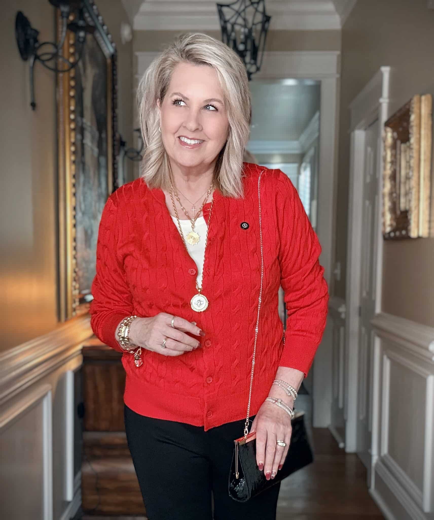 Tania wearing a red cable knit cardigan from Amazon