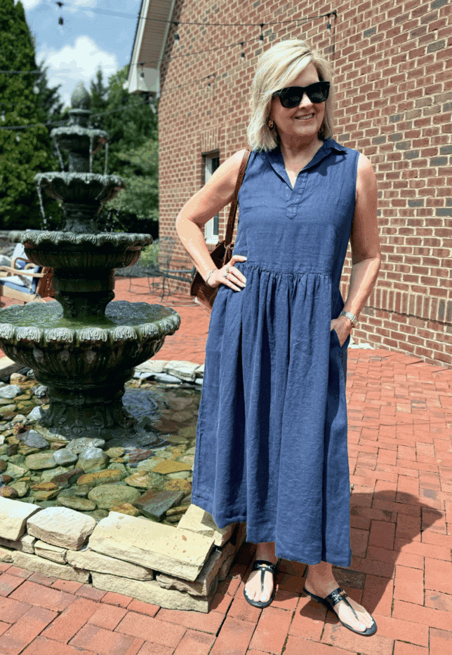 Tania wearing a navy linen dress from Frank & Eileen that's perfect fr a cruise.