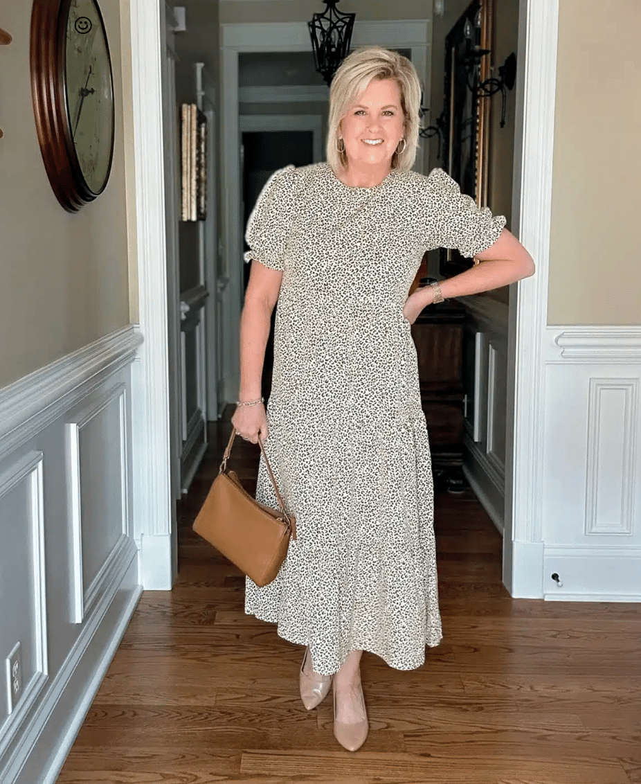 Tania wearing a boho midi dress with puff sleeves
