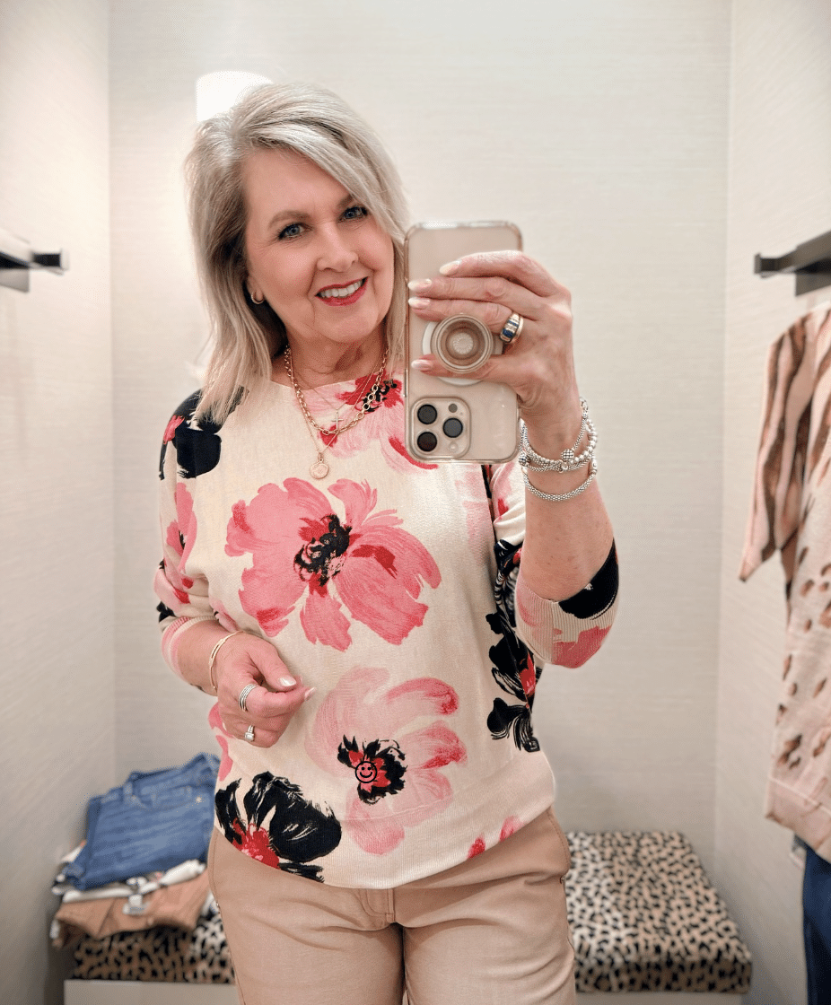 Tania wearing a floral sweater from Chico's new arrivals