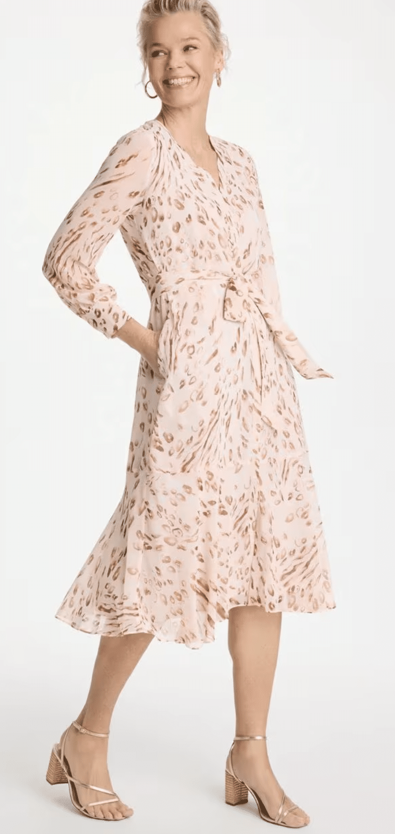 Woman wearing Chico’s cheetah georgette tie-waist shirtdress