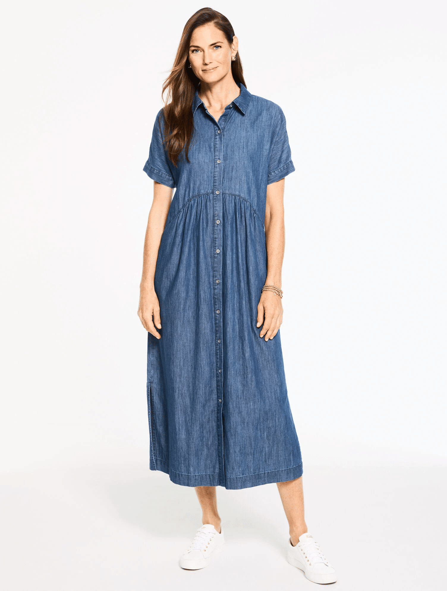 Classic denim shirtdress with relaxed fit and structured shape for an easy polished everyday look while traveling