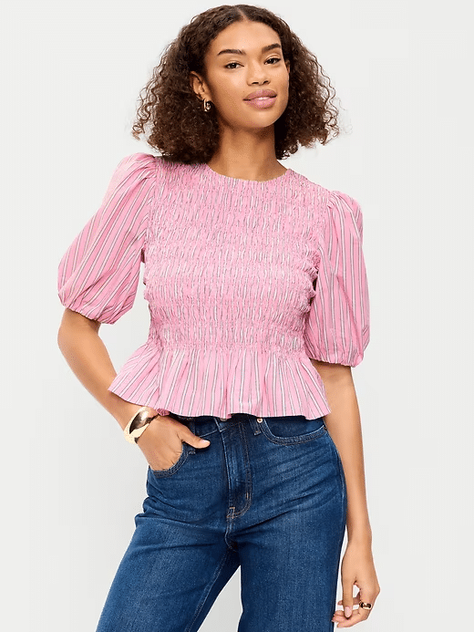 Cute peplum top that's smocked on top with slight waist flare styled with slim pants for a polished yet comfortable outfit