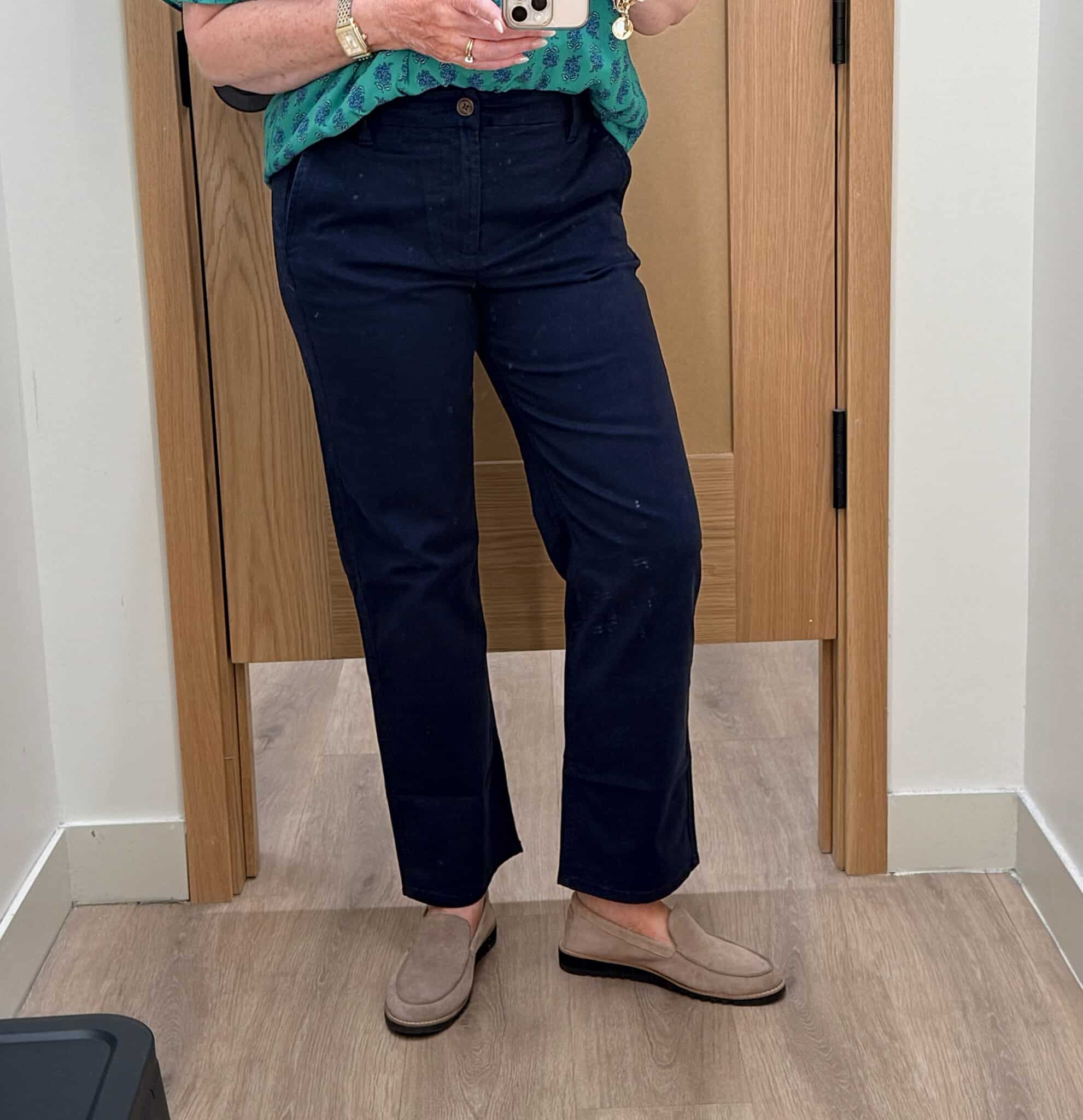 Tania wearing dark chinos from J.Crew Factory