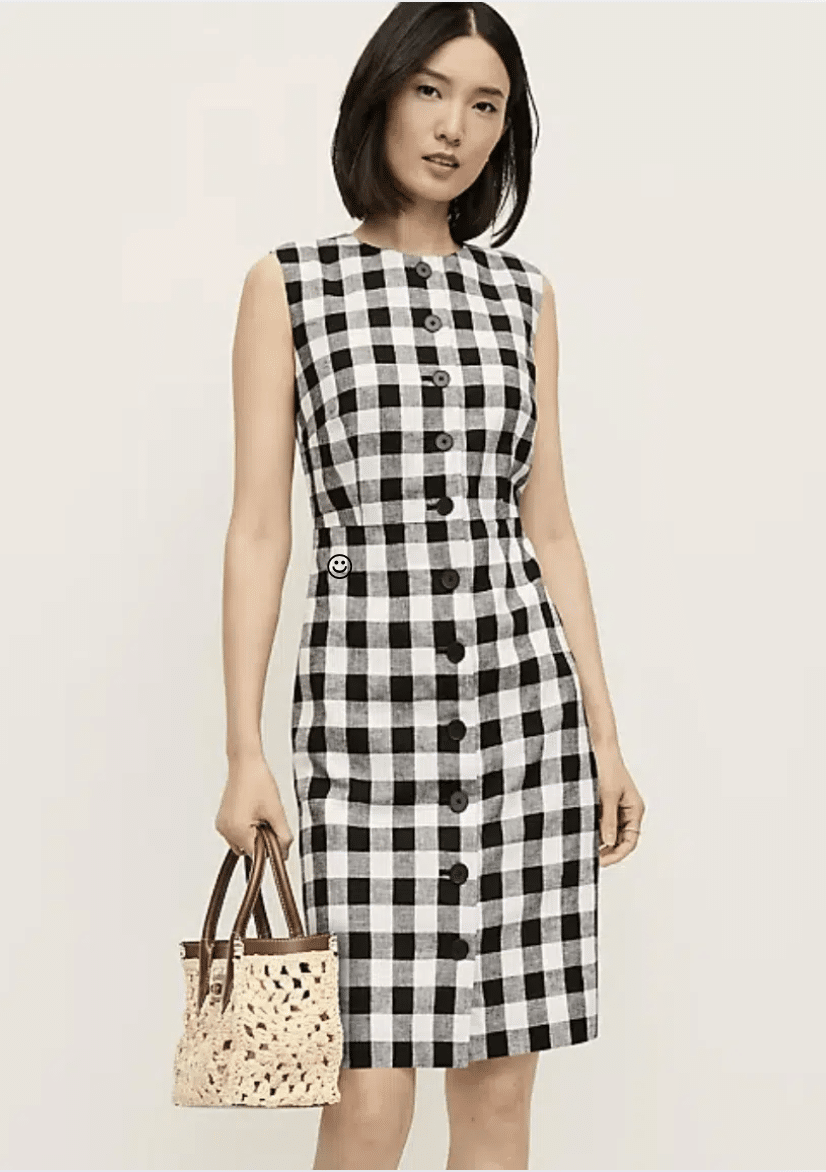 Petite woman wearing gingham column midi dress