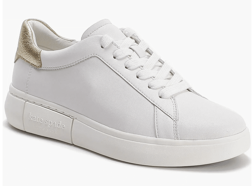 white kate spade platform sneakers with gold at heel