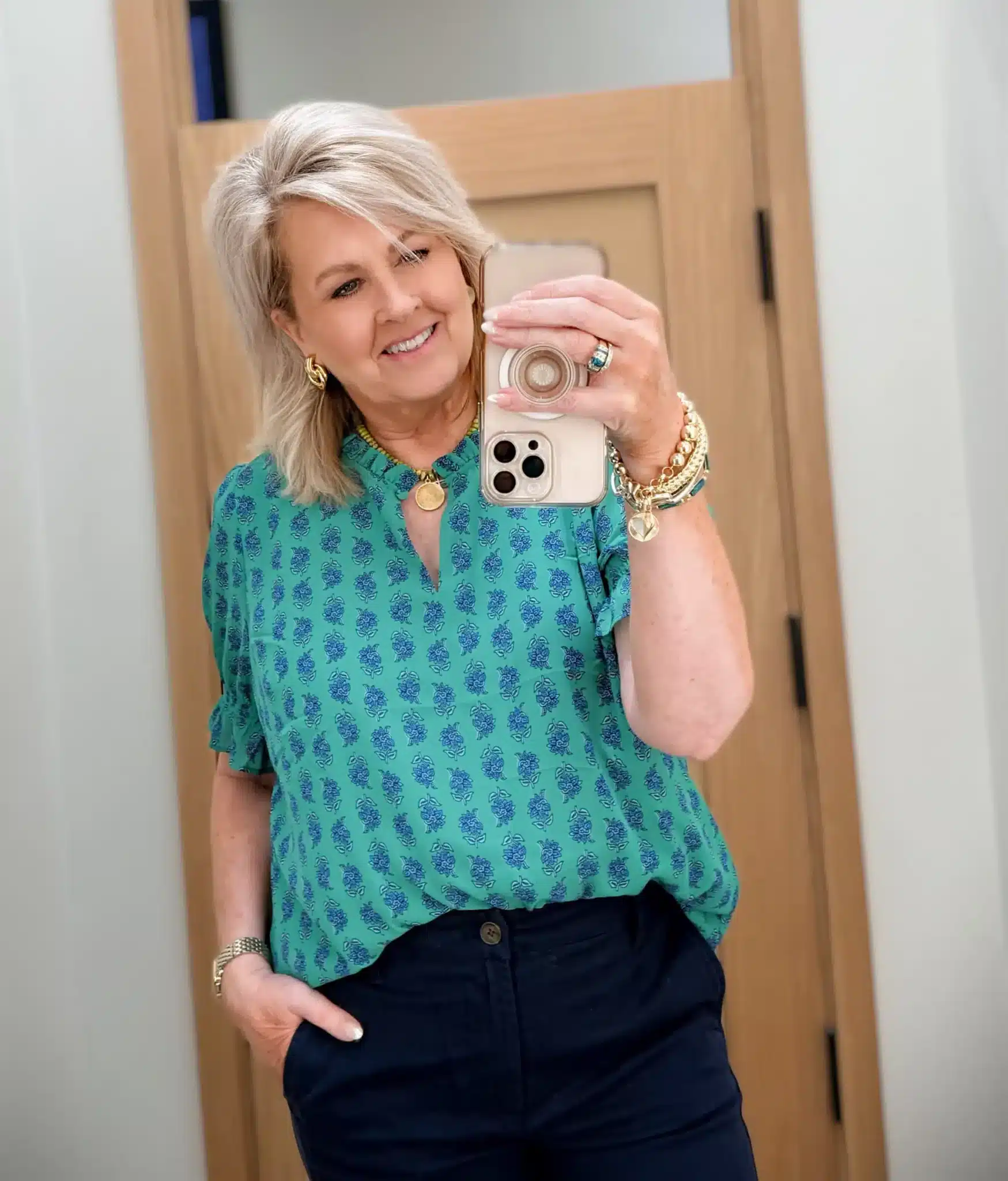 TANIA WEARING A V NECK