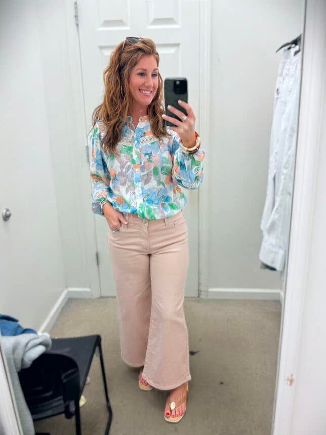 Stephanie styling a colorful button up top and colored jeans for petites from Belk