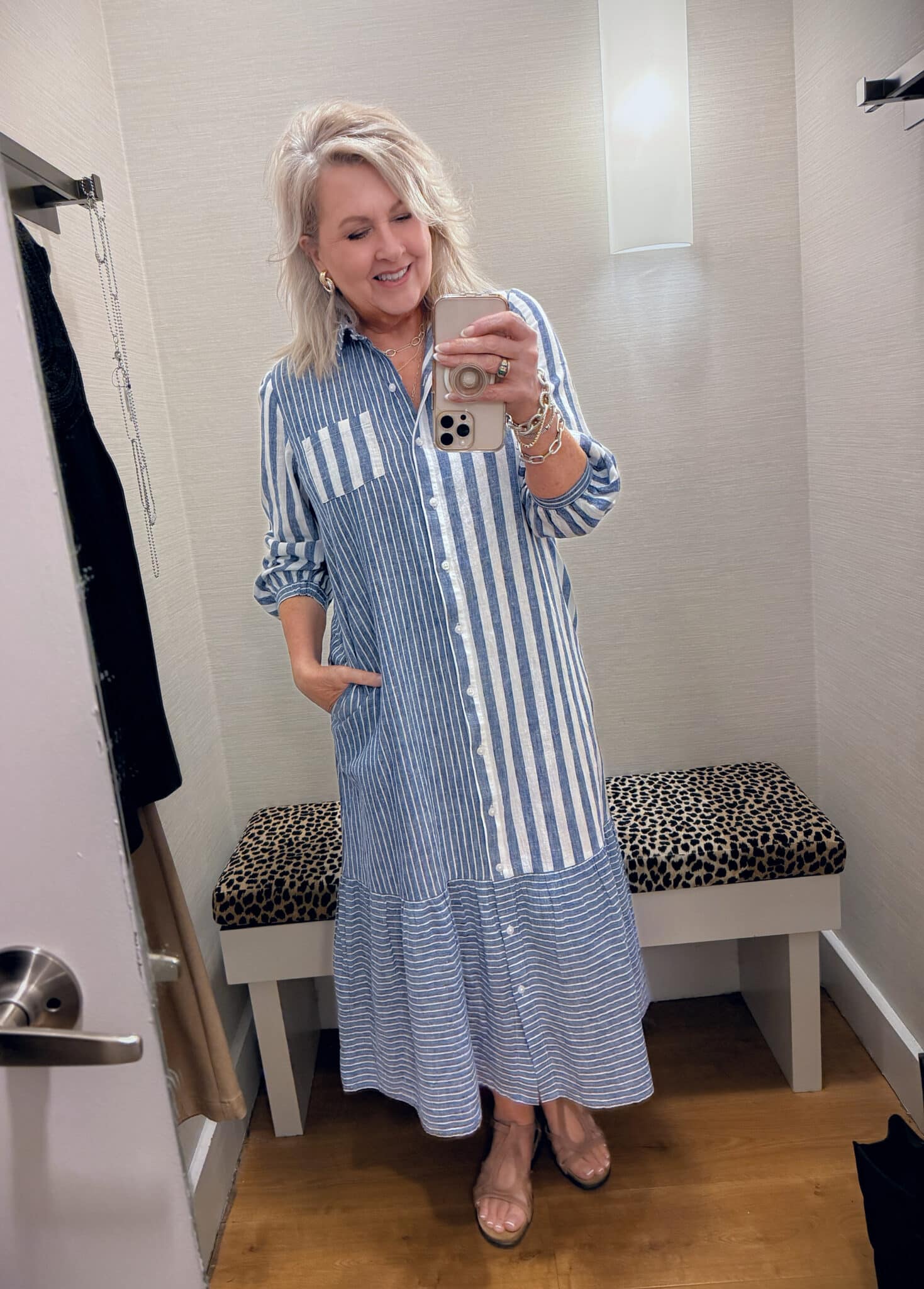 Tania wearing a Chico's navy & white striped button up dress