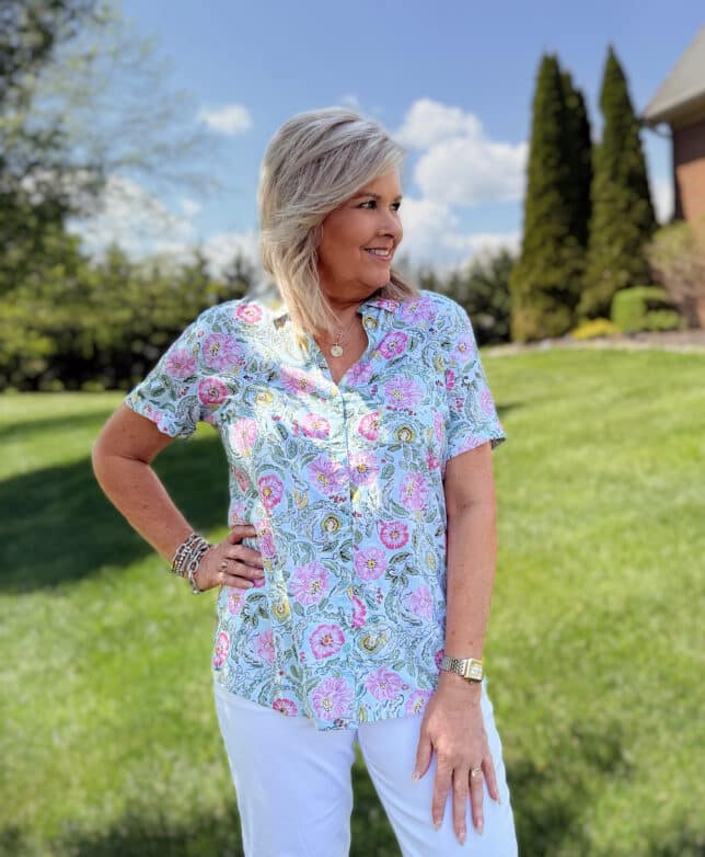 Tania from 50 is not old, is wearing a floral shirt from Kohls